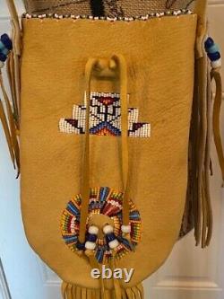 Douglas A Fast Horse Oglala Lakota Sioux bag beaded leather Native American