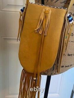 Douglas A Fast Horse Oglala Lakota Sioux bag beaded leather Native American