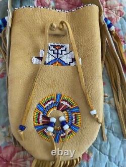 Douglas A Fast Horse Oglala Lakota Sioux bag beaded leather Native American