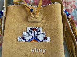 Douglas A Fast Horse Oglala Lakota Sioux bag beaded leather Native American